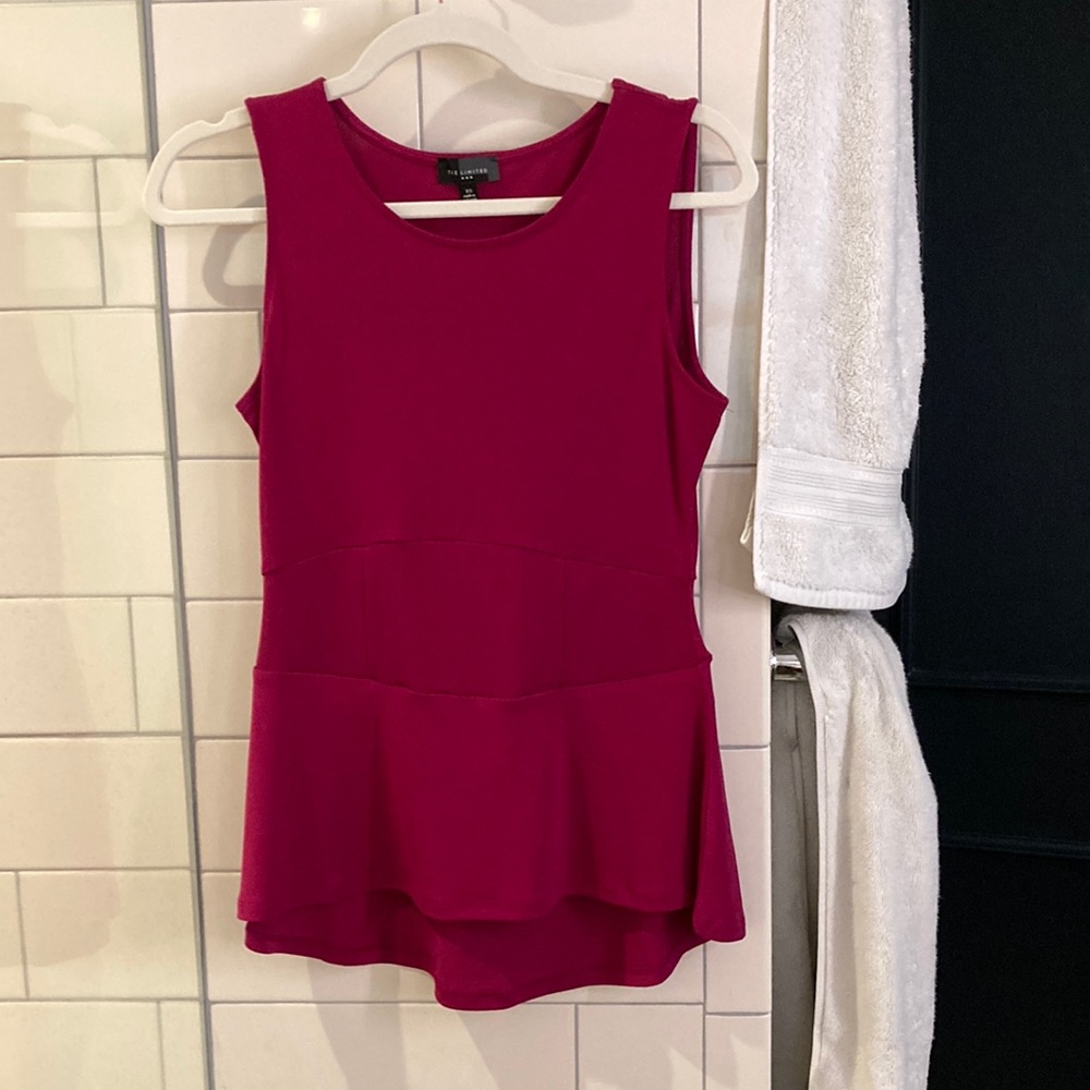 Sleeveless top with peplum bottom from the limited